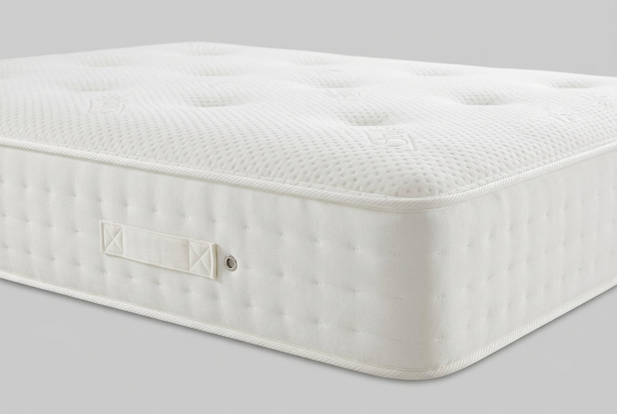 Ashford Bed Centre 1000 Four Seasons mattress showing its tufted surface and side handle

