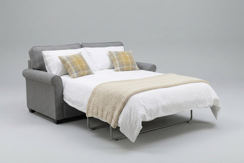 Alstons Poppy Sofa Bed, Open displayed in  Grey with Plaid scatter cushions in studio setting 